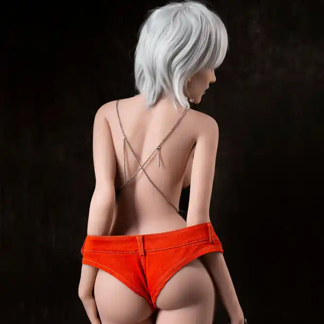 5ft 5in 165cm tall full size, slim ultra life like white female TPE Sex doll with C cup breasts, with varying wigs, blue lipstick and yellow eyes.  By OR Doll.