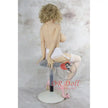 5ft 1in 156cm tall slim ultra life like TPE Sex doll with G cup breasts, mid length wavy blonde hair, bright red lipstick and brown eyes in lingerie.  By OR Doll.