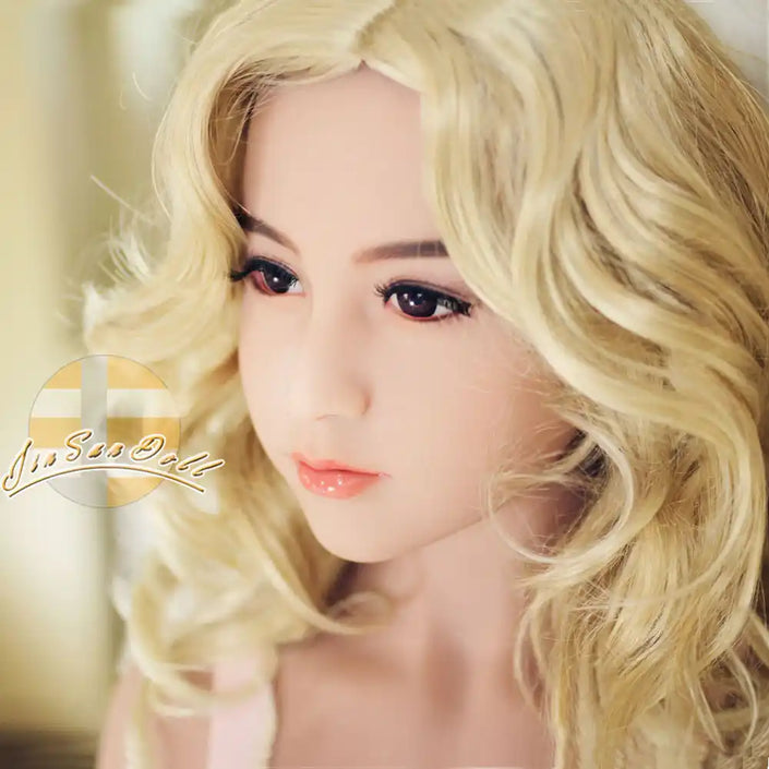 Hot full size 5ft 1in 156cm tall TPE sex doll with C cup breasts and long blonde wavy hair. By JS Doll. 